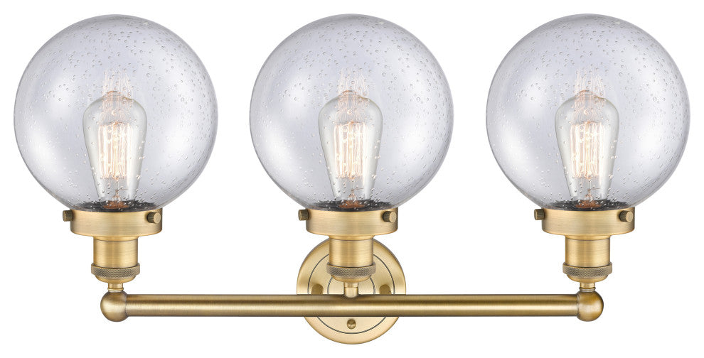 Edison Large Beacon 3-Light 25" Vanity Light, Brushed Brass Finish, Seedy Shade