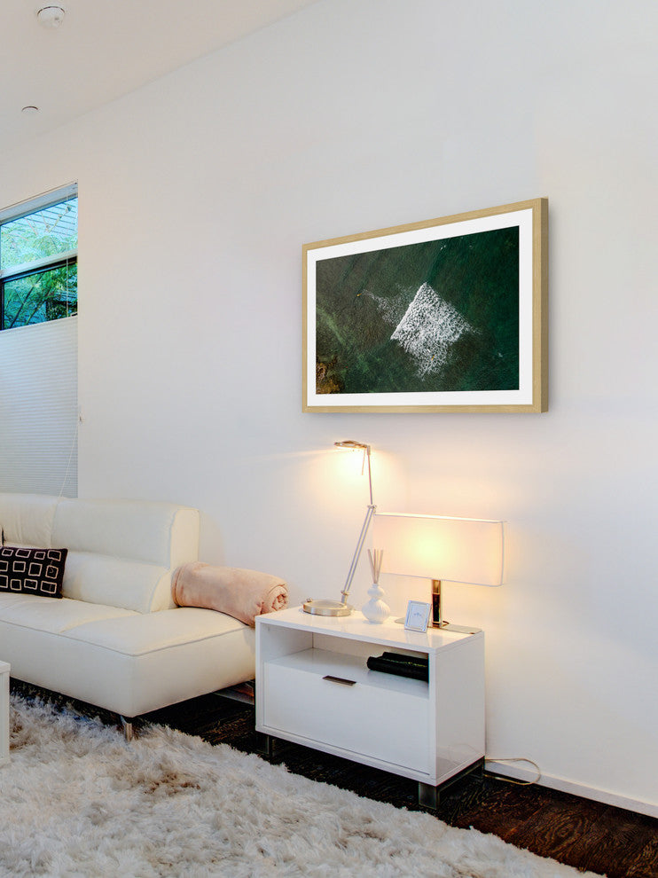 "Lost In The Waves" Framed Print by Karolis Janulis