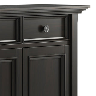 Close-up view of top drawer front on white background.