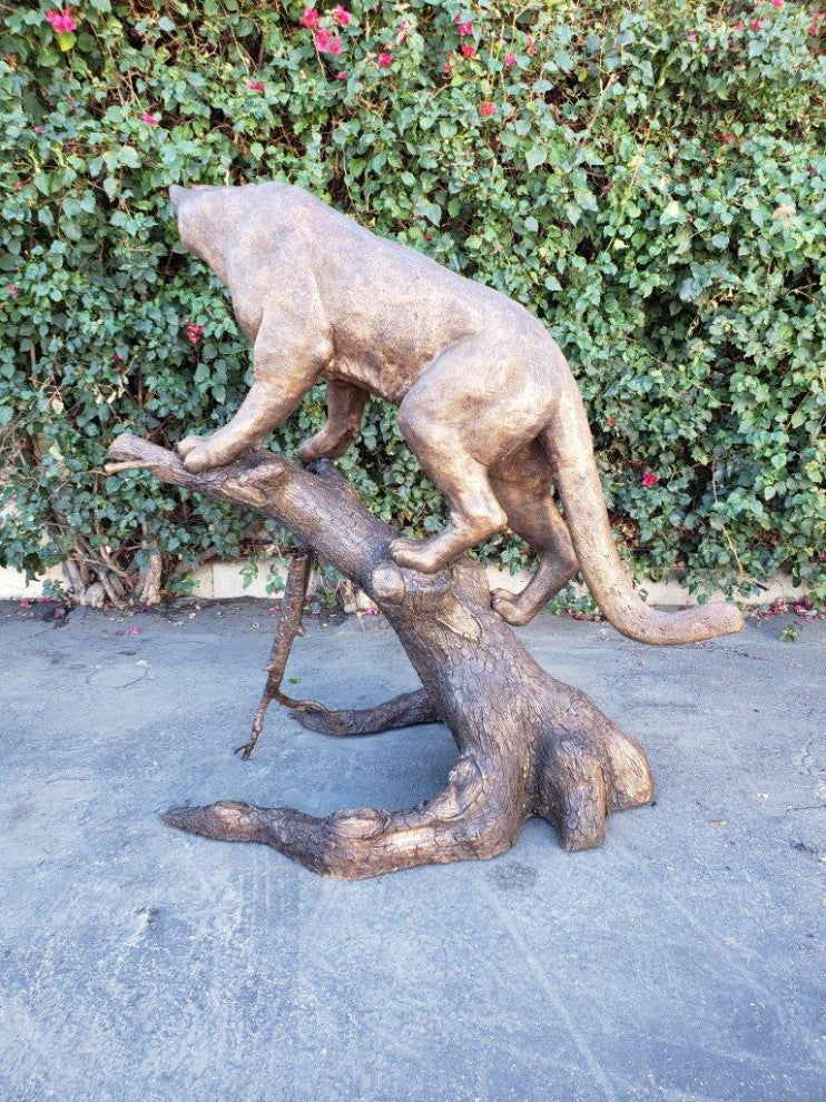 Mountain Lion Going Up a Tree Log Bronze Statue -  Size: 42"L x 65"W x 69"H.