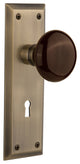 New York Plate Passage Brown Porcelain Knob, Antique Brass