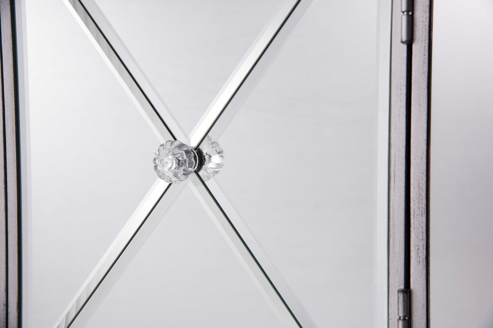 Close-up of door detailing (X-pattern) on white background; cropped/feature-focused.