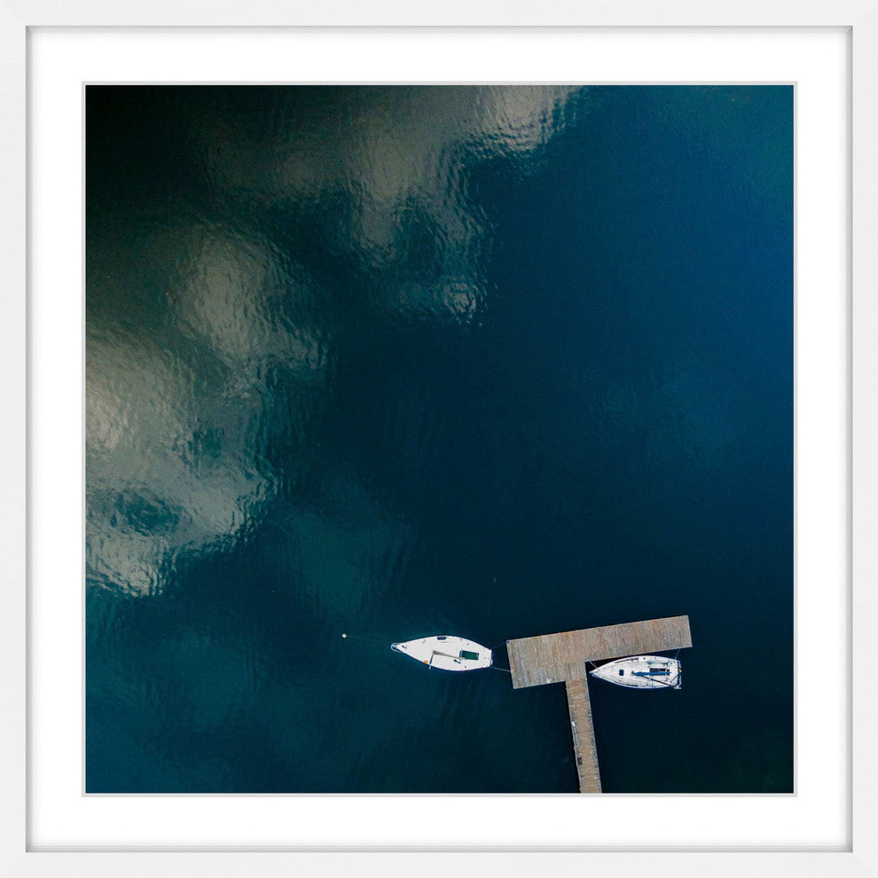 "White Boats Calm Lake" Framed Print by Karolis Janulis