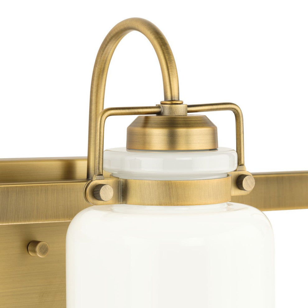 Fessler Collection Three-Light Vintage Brass Opal Glass Farmhouse Bath Light