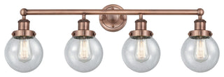 Small Beacon 4-Light 34" Bath Vanity Light, Antique Copper Finish, Seedy Shade
