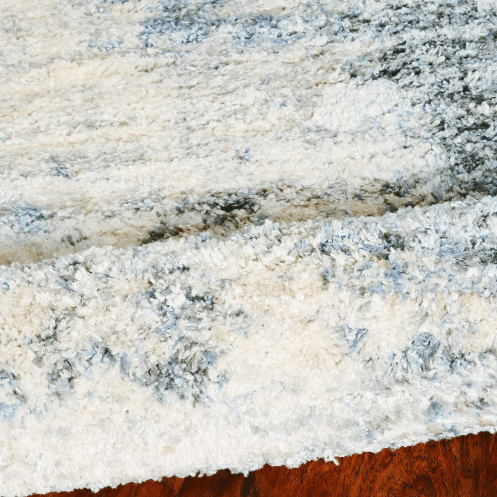 5'X8' Ivory Blue Machine Woven Abstract Indoor Area Rug