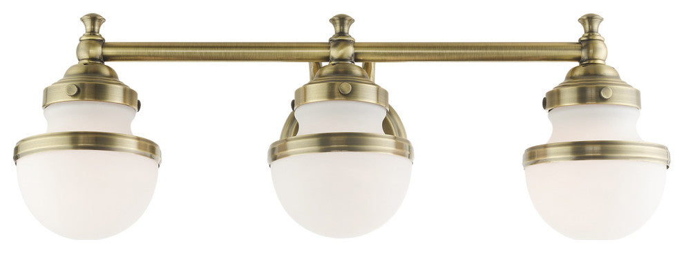 Livex Lighting Oldwick 3 Light Antique Brass Vanity Sconce