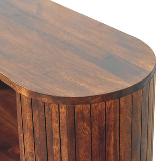 Close-up view of curved top on white background (detail shot).