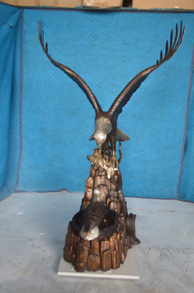 Eagle with nest Bronze Statue -  Size: 36"L x 40"W x 63"H.