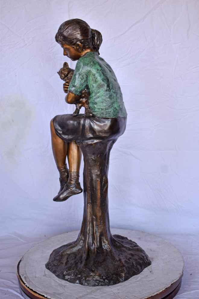 Girl Sitting on A Log With Her Cat Bronze Statue Size: 15"L x 15"W x 35"H.