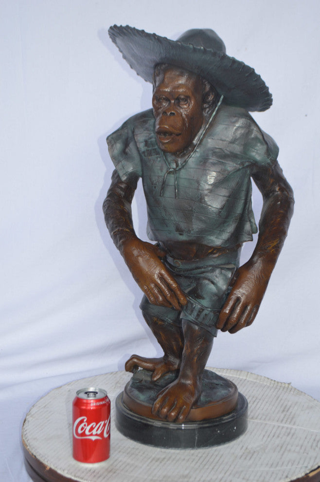 Monkey Cowboy bronze statue - Size: 14"L x 12"W x 29"H.