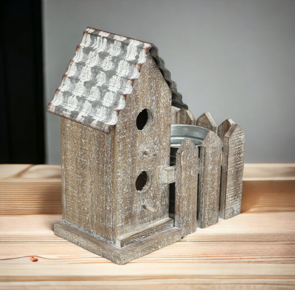 2 Story Bird house With Galvanized pot in yard