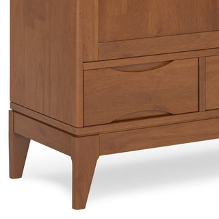 White background, close-up of bottom drawer/leg area.