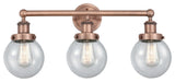 Small Edison Beacon 3-Light 25" Vanity Light, Antique Copper Finish, Seedy Shade