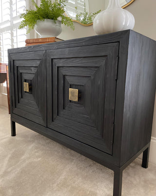 Lifestyle room setting showing cabinet with surrounding decor.