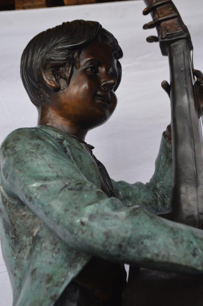 Boy playing cello large bronze statue -  Size: 19"L x 22"W x 59"H.