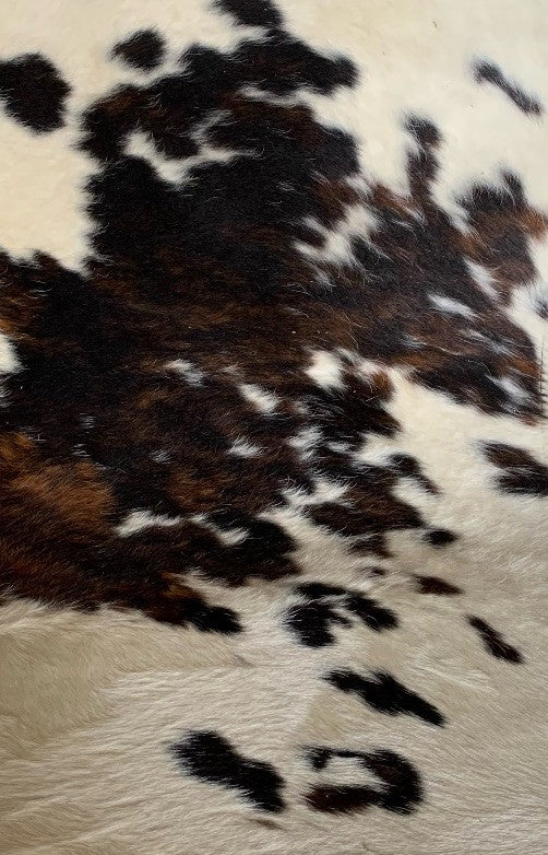 Cowhide Accent Chair in Brown, Black and White