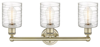 Edison Cobbleskill 3-Light 23" Vanity Light, Antique Brass With Deco Swirl Shade