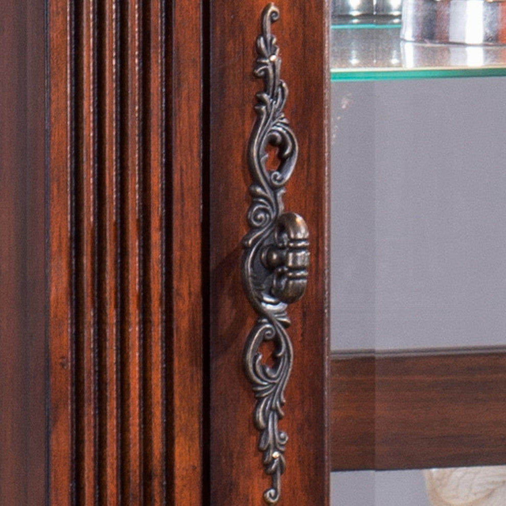 Close-up of decorative hardware on a wood panel; background not white.