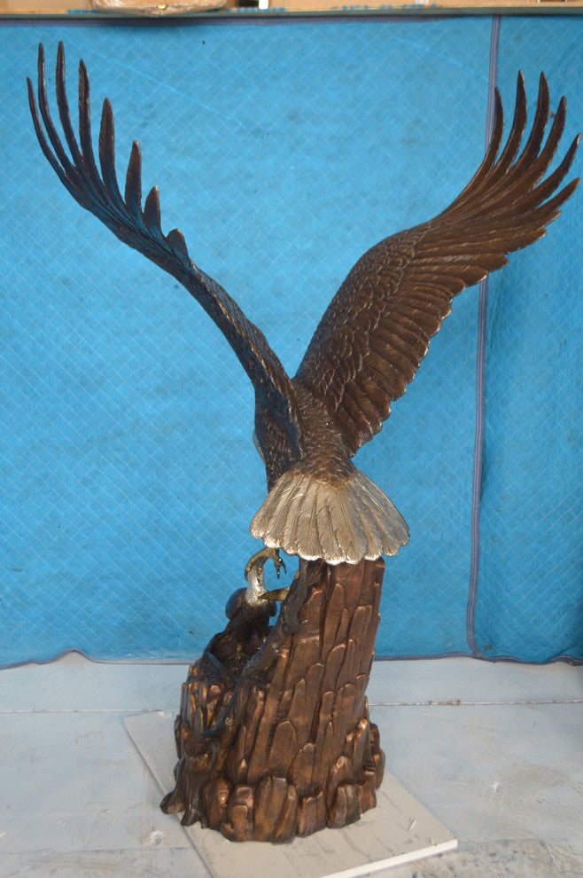 Eagle with nest Bronze Statue -  Size: 36"L x 40"W x 63"H.