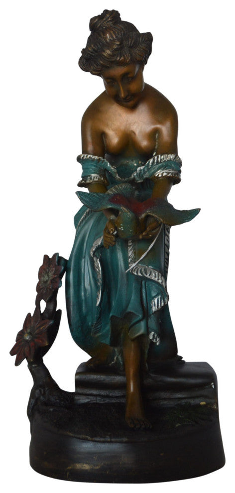 Lady holding a bird bronze statue - Size: 10"L x 9"W x 20"H.