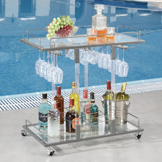 Lifestyle image by a pool with bottles on the cart.
