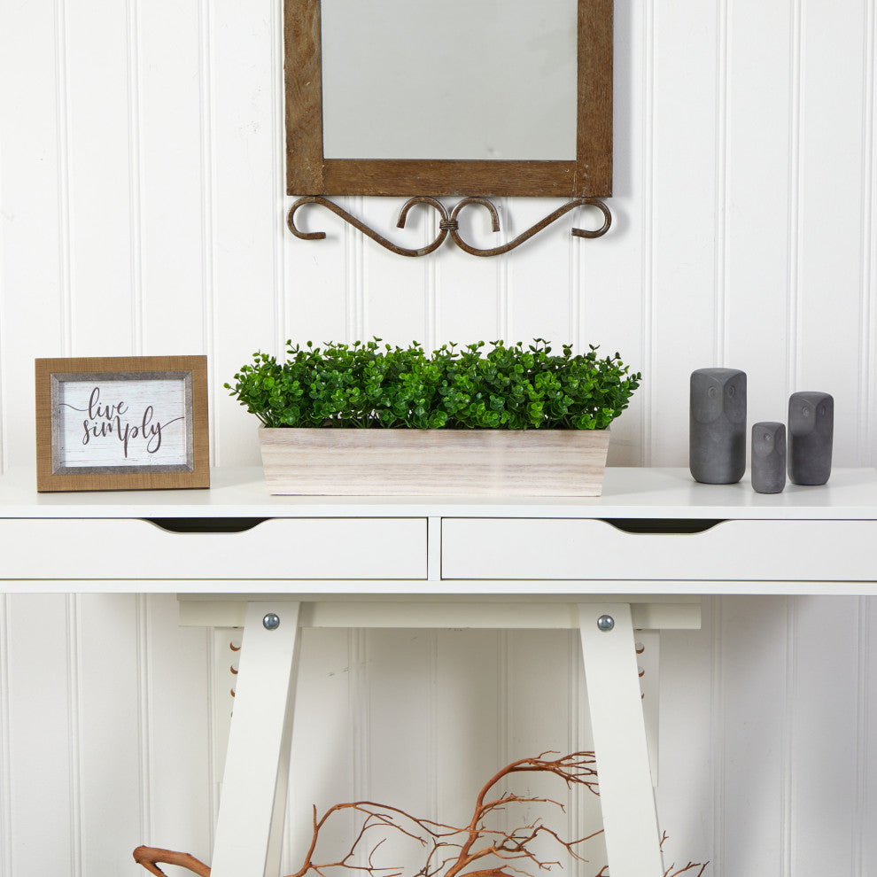 Lifestyle scene on a desk with decor; product visible in real environment.