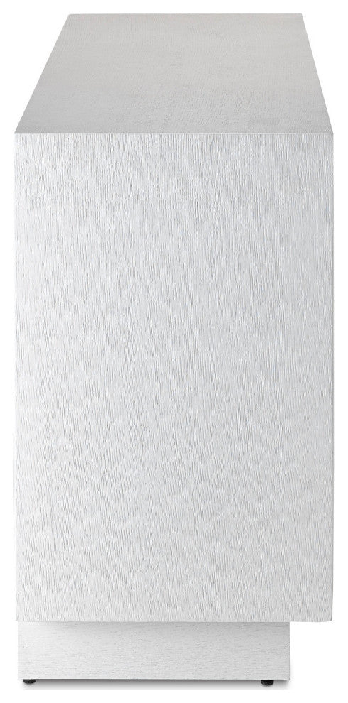 Ambiguous object; isolated white block; not clearly part of Morombe credenza.