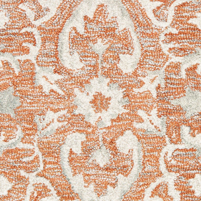 9" x 12" Orange and Ivory Medallion Area Rug