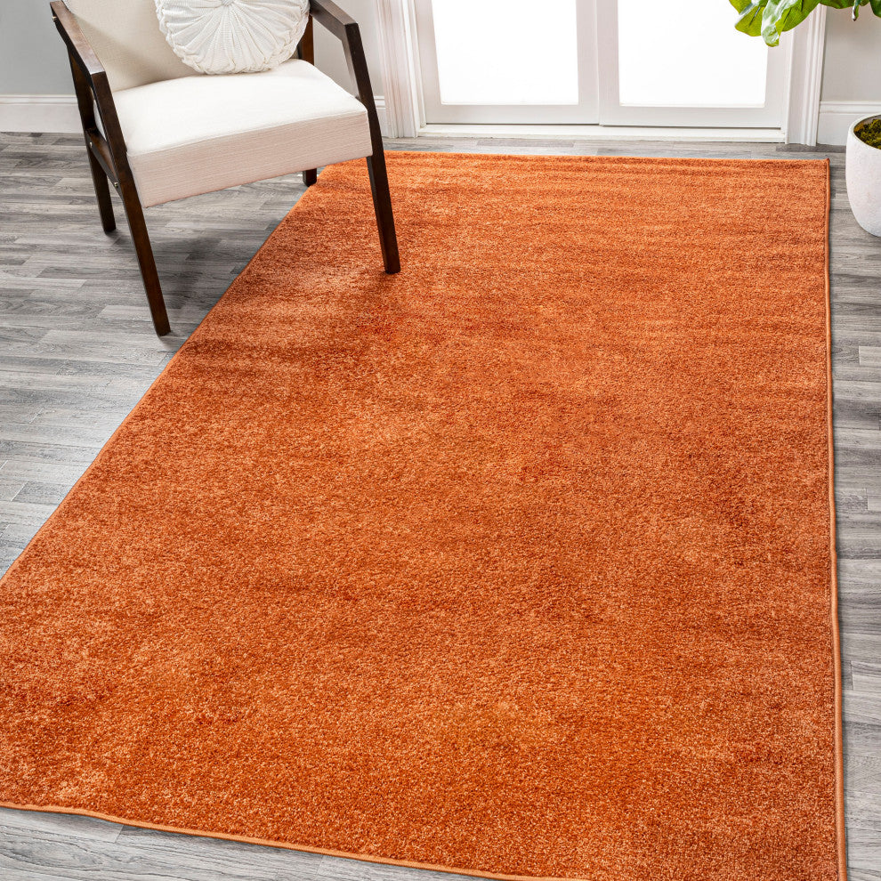 Haze Solid Low-Pile Orange 6 ft. x 9 ft. Area Rug