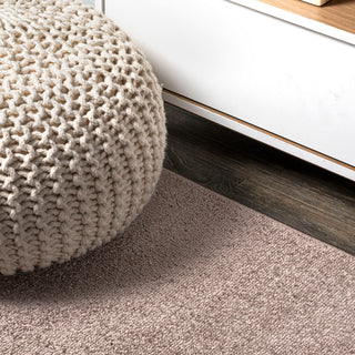 Haze Solid Low-Pile Brown 6 ft. x 9 ft. Oval Area Rug