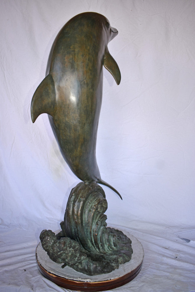 Fountain of A Dolphin Jumping of The Water Made of Bronze Size: 21"x 30" x 50"