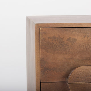 Close-up crop on white background showing upper drawer area and rounded handle