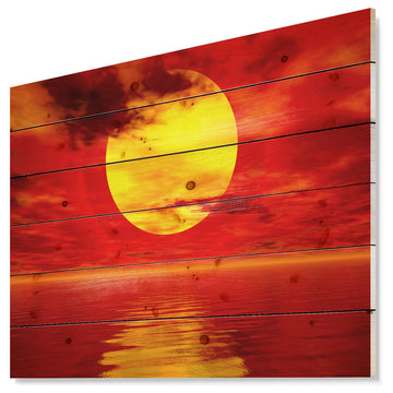 Designart Golden Sun Sinking Red Waters Seashore Wood Wall Art 46x36