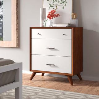 Lifestyle shot: dresser in a real room environment with decor; full product visible.