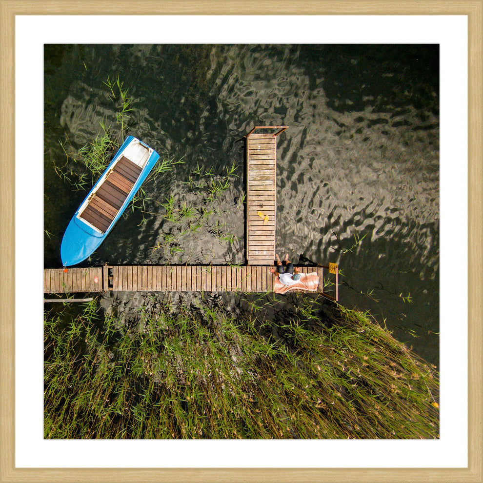 "Blue Boat" Framed Print by Karolis Janulis