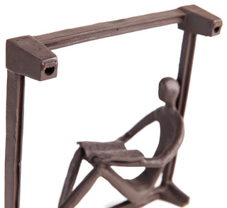 Man Reading on a Window Sill Hanging Wall Art Iron Sculpture
