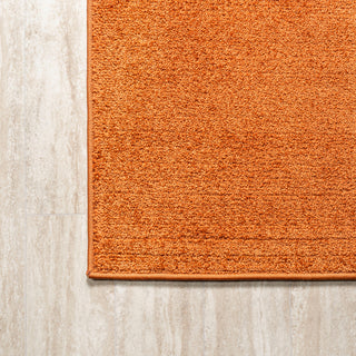 Haze Solid Low-Pile Orange 6' Round Area Rug