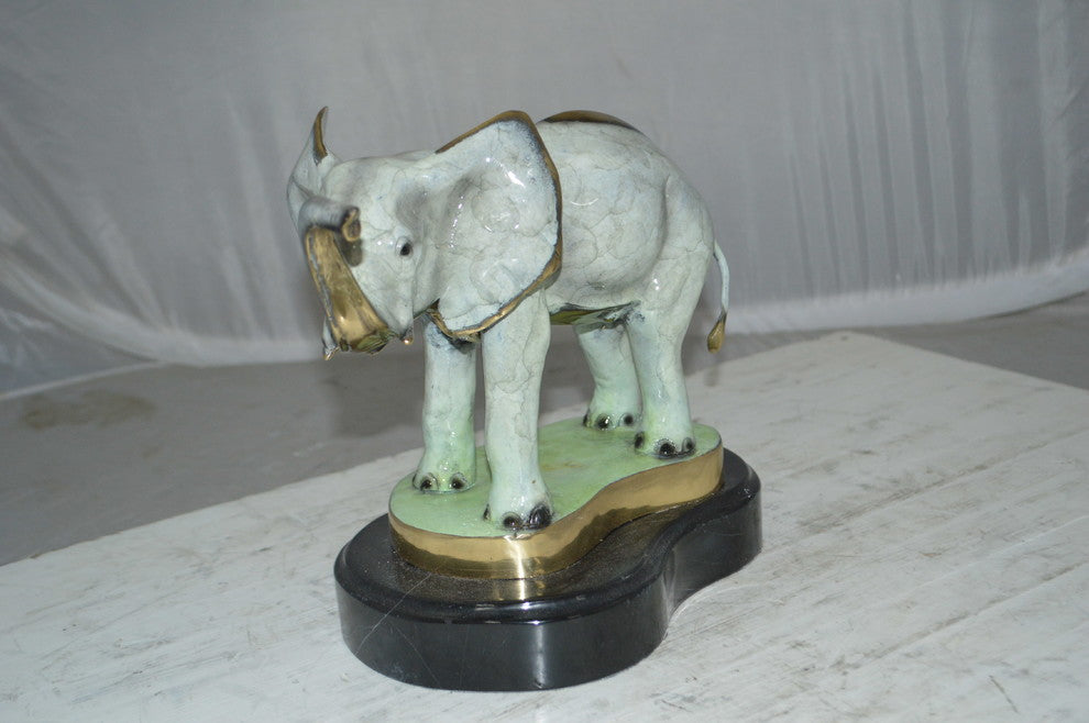Elephant trunk Up Bronze Statue -  Size: 16"L x 9"W x 10"H.