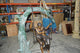 Lovers on a Swing Bronze Statue -  Size: 48"L x 32"W x 64"H.