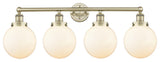 Large Beacon 4-Light 34" Vanity Light, Antique Brass Finish, Matte White Shade