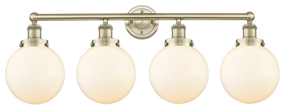 Large Beacon 4-Light 34" Vanity Light, Antique Brass Finish, Matte White Shade