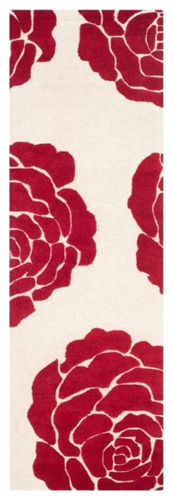 Safavieh Cambridge 6' Round Hand Tufted Wool Rug in Ivory and Red