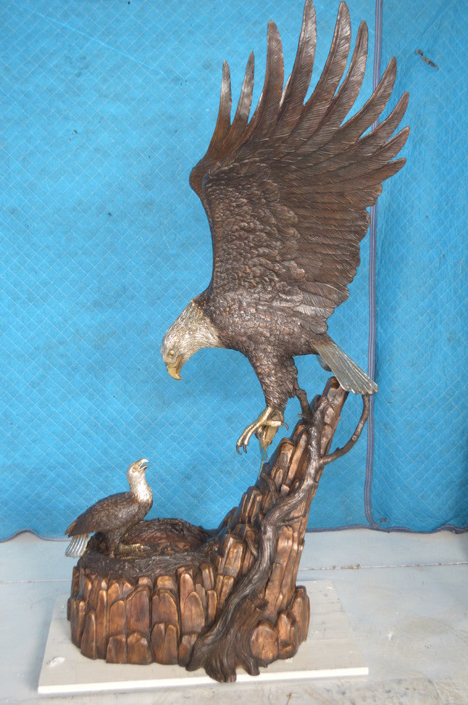 Eagle with nest Bronze Statue -  Size: 36"L x 40"W x 63"H.