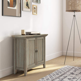 Shown in a real room setting (lifestyle) with decor and flooring.