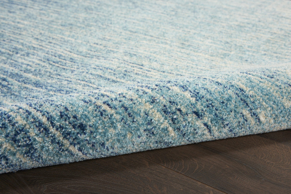 8 Round Navy and Light Blue Abstract Area Rug