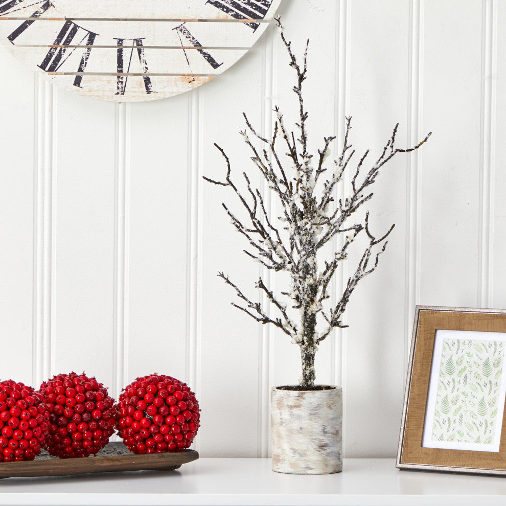 Lifestyle photo showing the artificial tree in a decor setting.