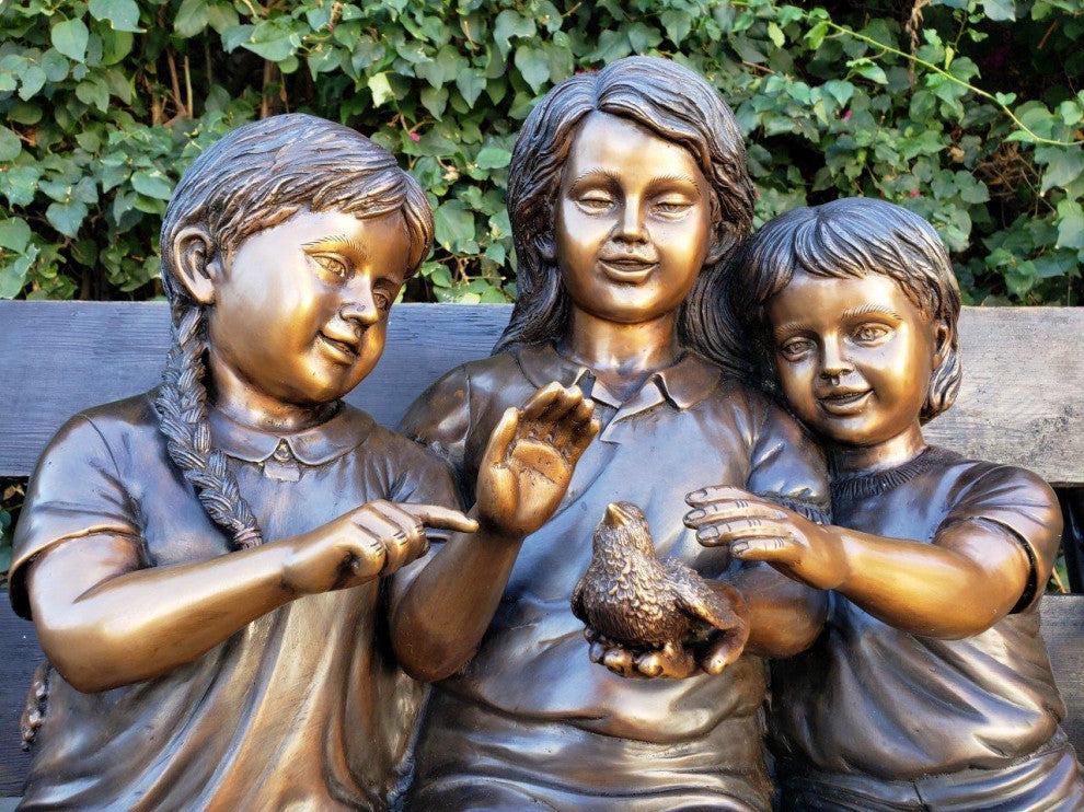 Three kids on a Bench Holding a Bird Bronze Statue -  Size: 40"L x 30"W x 33"H