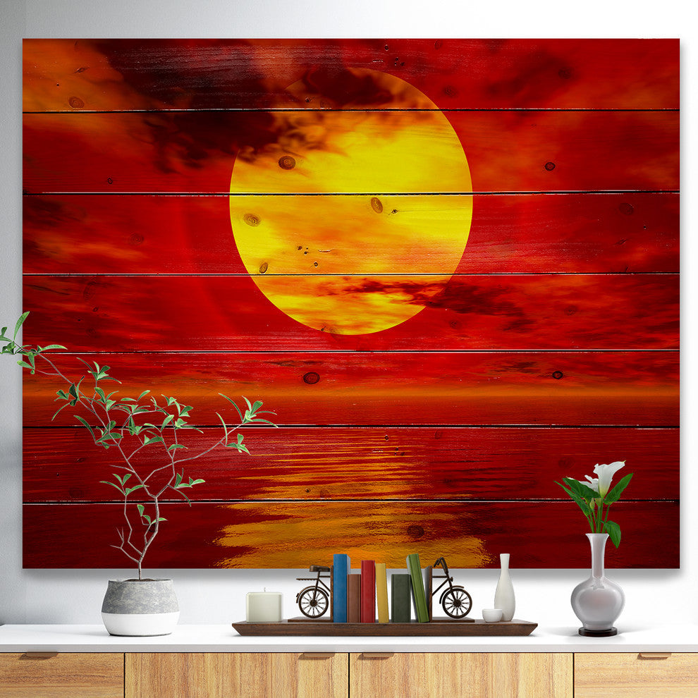 Designart Golden Sun Sinking Red Waters Seashore Wood Wall Art 46x36