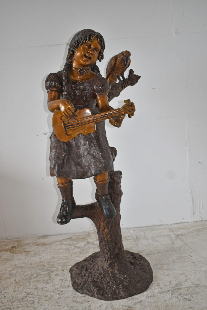 Girl on a Tree Playing the Ukulele With a Parrot Bronze Statue 25" x 23" x 50"